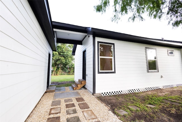 601 S Carroll St, La Porte, TX 77571 - view of property exterior featuring entry steps and crawl space