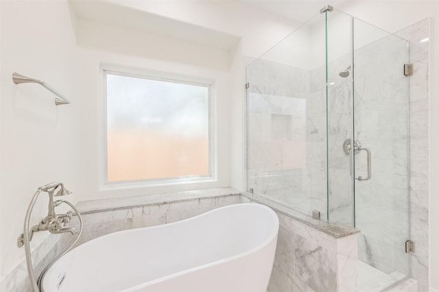 10618 Bassoon Dr, Houston, TX 77025 - full bathroom featuring a soaking tub and a marble finish shower