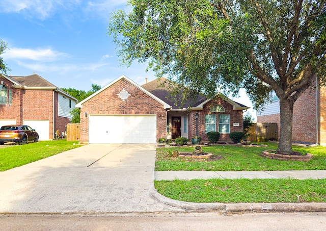4906 Arbor Falls Ln, Houston, TX 77084 - traditional home with a garage, concrete driveway, and brick siding