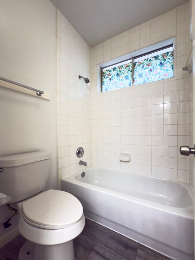 4906 Arbor Falls Ln, Houston, TX 77084 - bathroom featuring wood finished floors, toilet, and shower / tub combination