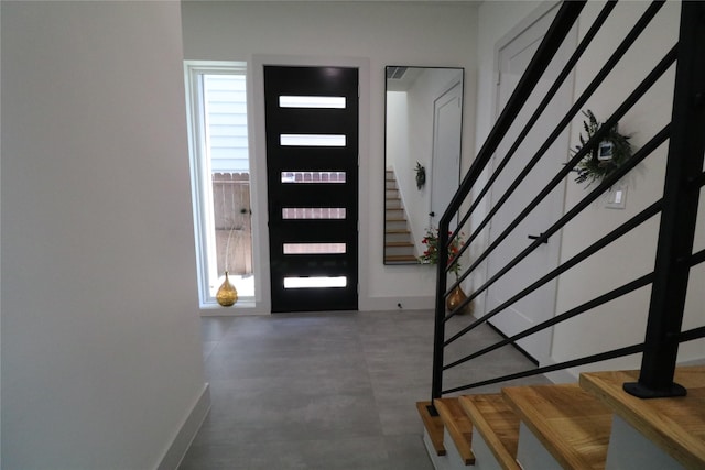 113 E 32nd St Unit A, Houston, TX 77018 - entryway with stairs, concrete floors, and baseboards