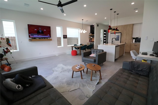 113 E 32nd St Unit A, Houston, TX 77018 - living area featuring ceiling fan, a chandelier, and recessed lighting