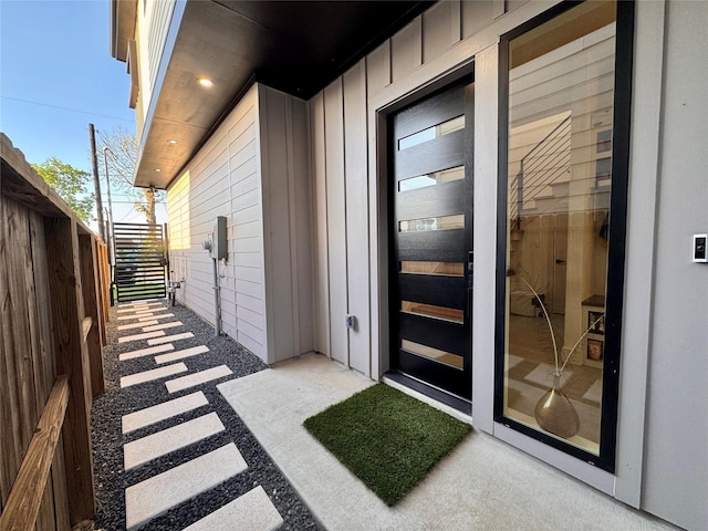 113 E 32nd St Unit A, Houston, TX 77018 - view of exterior entry featuring board and batten siding