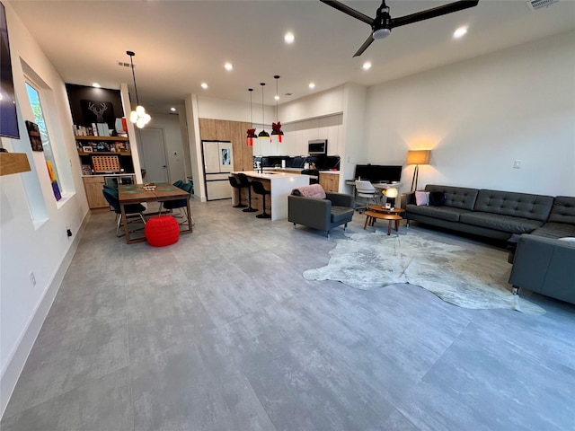 113 E 32nd St Unit A, Houston, TX 77018 - living area featuring ceiling fan, recessed lighting, and baseboards