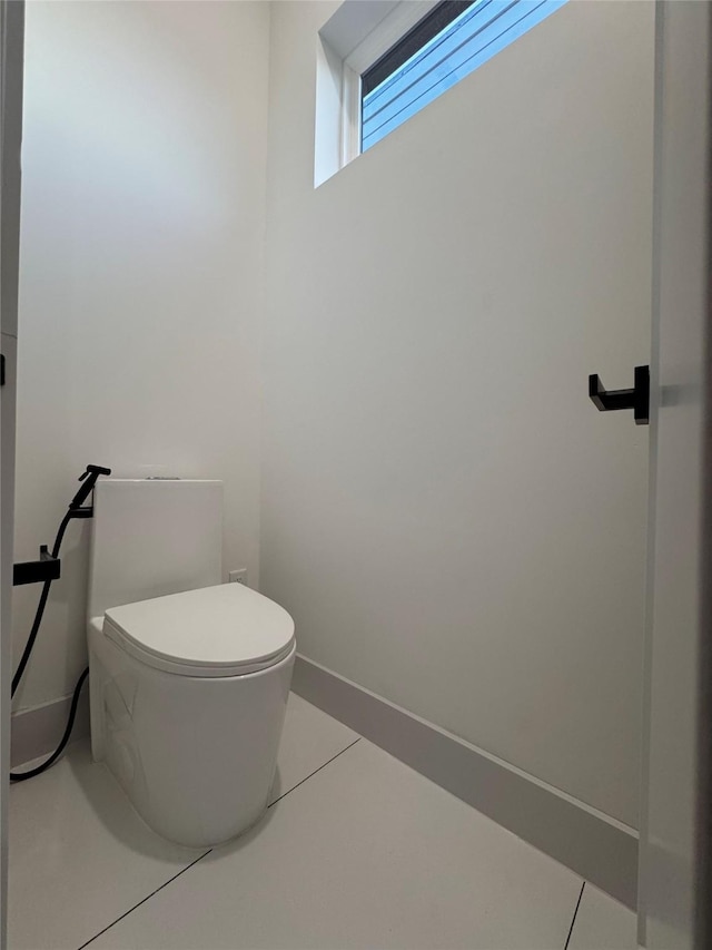 113 E 32nd St Unit A, Houston, TX 77018 - bathroom featuring toilet and tile patterned floors