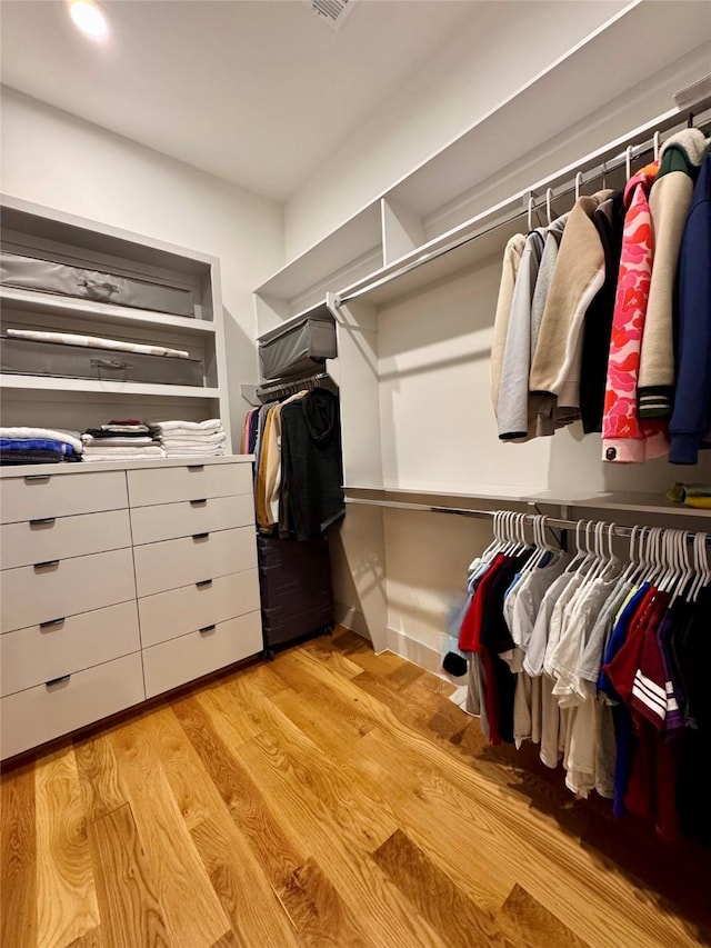 113 E 32nd St Unit A, Houston, TX 77018 - walk in closet featuring light wood-style flooring