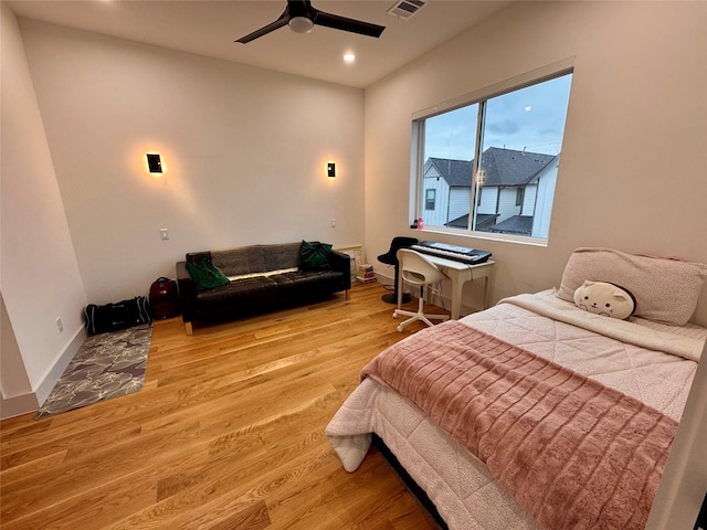 113 E 32nd St Unit A, Houston, TX 77018 - bedroom with wood finished floors, recessed lighting, ceiling fan, and baseboards