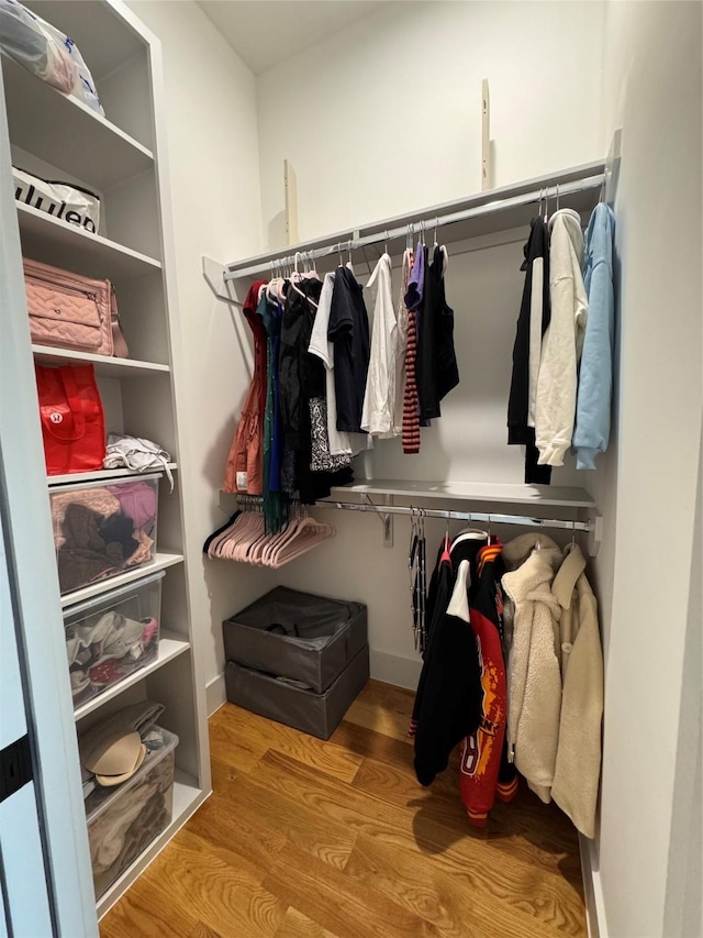 113 E 32nd St Unit A, Houston, TX 77018 - walk in closet featuring wood finished floors