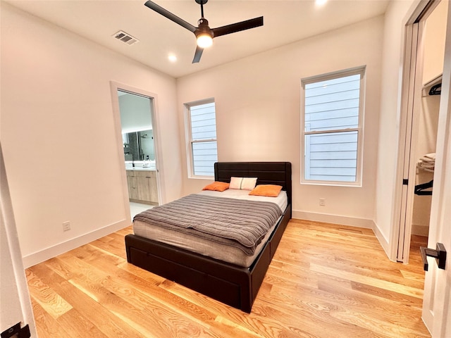 113 E 32nd St Unit A, Houston, TX 77018 - bedroom featuring baseboards, light wood-style floors, ensuite bathroom, and recessed lighting