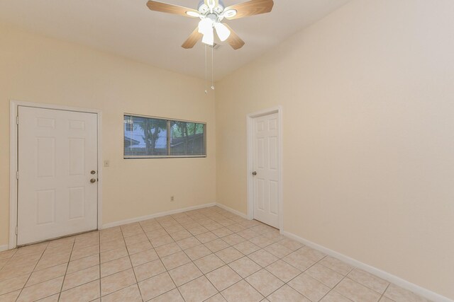 18610 Anne Dr, Webster, TX 77058 - unfurnished room with a ceiling fan, baseboards, and light tile patterned flooring