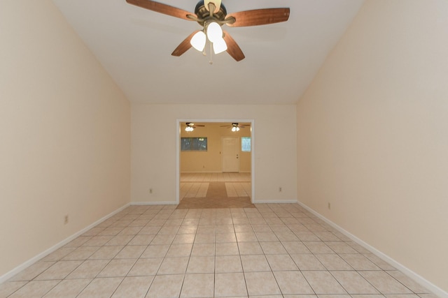 18610 Anne Dr, Webster, TX 77058 - spare room with a ceiling fan, vaulted ceiling, and baseboards