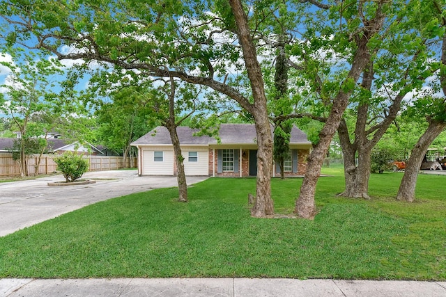 18610 Anne Dr, Webster, TX 77058 - single story home with concrete driveway and brick siding