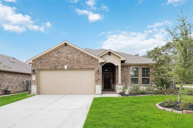 18219 Octavio Frias Trl, Houston, TX 77044 - ranch-style home with brick siding, an attached garage, concrete driveway, a front lawn, and roof with shingles