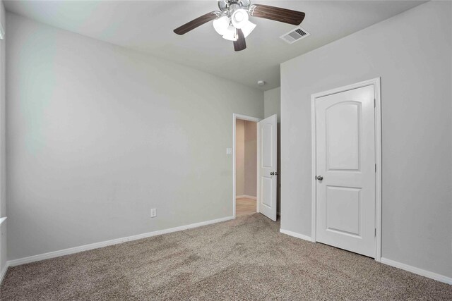 18219 Octavio Frias Trl, Houston, TX 77044 - unfurnished bedroom with carpet and a ceiling fan