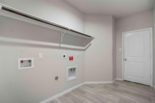 18219 Octavio Frias Trl, Houston, TX 77044 - laundry room with hookup for an electric dryer, washer hookup, gas dryer hookup, and light wood-style flooring