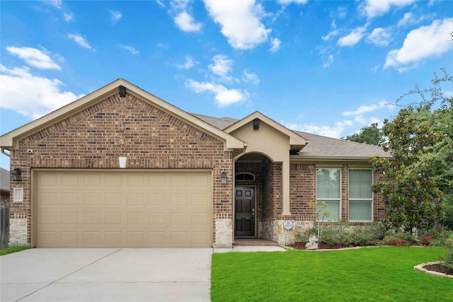 18219 Octavio Frias Trl, Houston, TX 77044 - ranch-style home featuring driveway, brick siding, a front lawn, a garage, and stone siding