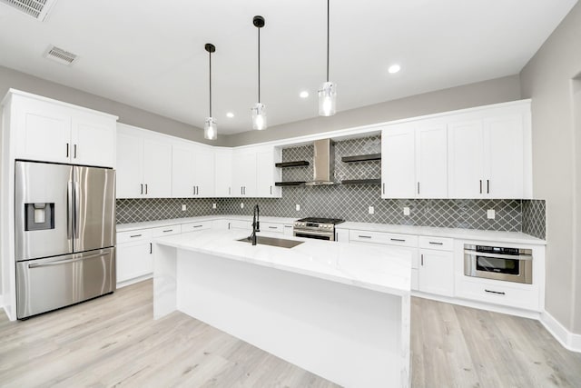 1805 Blodgett St, Houston, TX 77004 - kitchen with stainless steel appliances, a sink, white cabinetry, open shelves, and recessed lighting