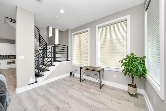 1805 Blodgett St, Houston, TX 77004 - staircase with wood finished floors and healthy amount of natural light