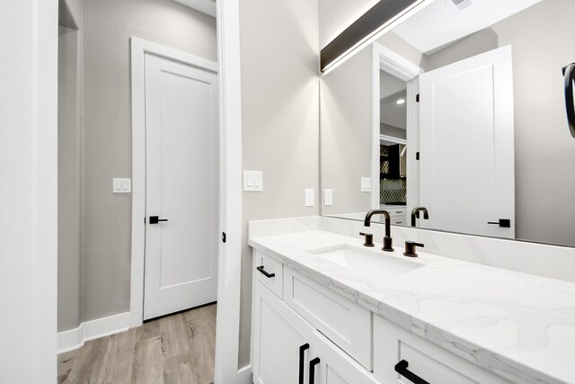 1805 Blodgett St, Houston, TX 77004 - bathroom with wood finished floors and vanity
