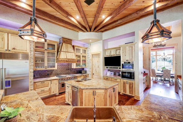 10002 Oxted Ln, Spring, TX 77379 - kitchen with premium appliances, custom exhaust hood, light wood-style floors, backsplash, and wood ceiling with exposed beams