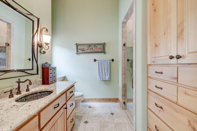 10002 Oxted Ln, Spring, TX 77379 - full bathroom featuring toilet, vanity, a stall shower, baseboards, and tile patterned flooring