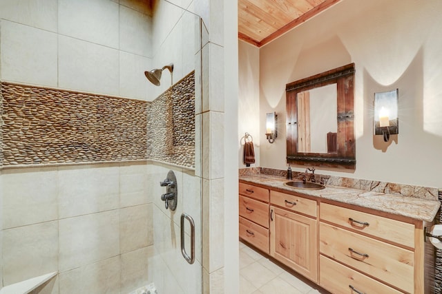 10002 Oxted Ln, Spring, TX 77379 - bathroom with tiled shower, vanity, tile patterned flooring, and wooden ceiling