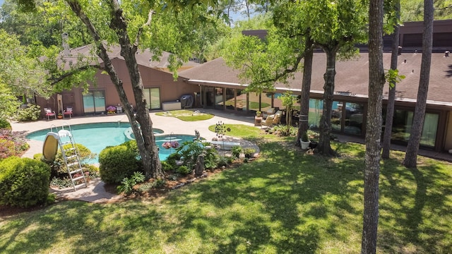 10318 Pine Forest Rd, Houston, TX 77042 - outdoor pool featuring a lawn and a patio area