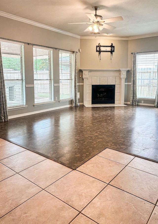 9203 Baber Run Cir, Houston, TX 77095 - unfurnished living room featuring healthy amount of natural light, a fireplace, ornamental molding, ceiling fan, and baseboards