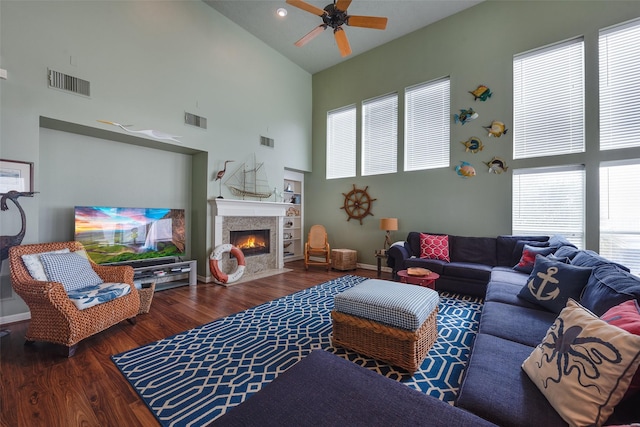 131 Isles End Rd, Tiki Island, TX 77554 - living room with high vaulted ceiling, a ceiling fan, wood finished floors, and healthy amount of natural light