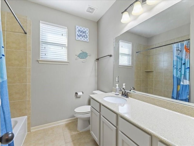 17806 Creek Bluff Ln, Cypress, TX 77433 - bathroom with vanity, toilet, tile patterned flooring, shower / tub combo with curtain, and baseboards