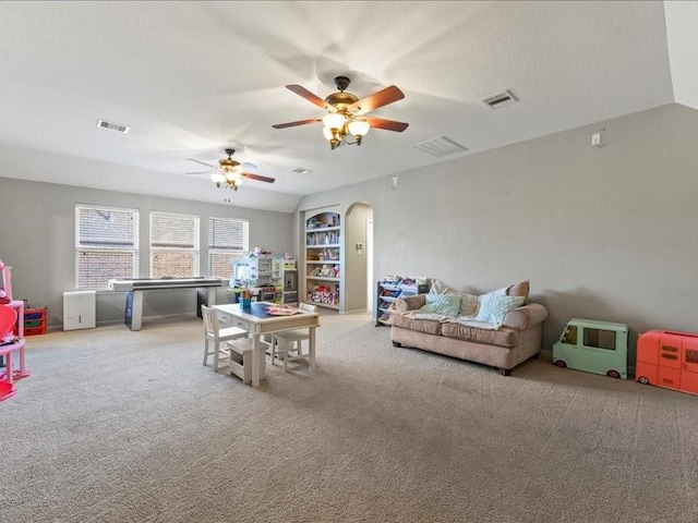 17806 Creek Bluff Ln, Cypress, TX 77433 - carpeted living area featuring arched walkways and a ceiling fan