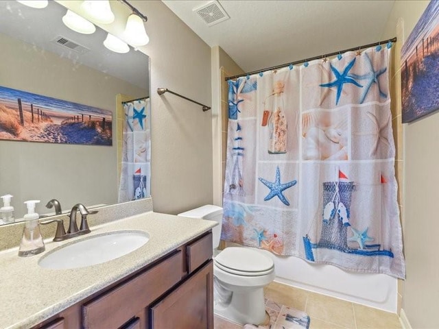 17806 Creek Bluff Ln, Cypress, TX 77433 - bathroom with vanity, toilet, tile patterned floors, and shower / bath combination with curtain