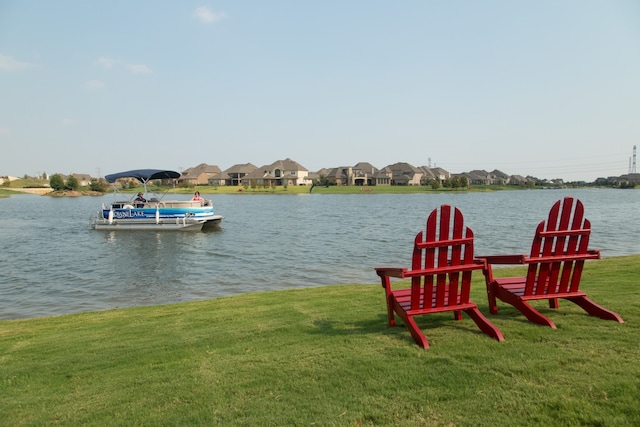 17806 Creek Bluff Ln, Cypress, TX 77433 - dock with a yard, a water view, and a residential view