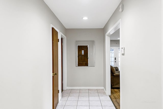 6902 Wagonwheel Ln, Houston, TX 77088 - corridor with baseboards, recessed lighting, and light tile patterned floors