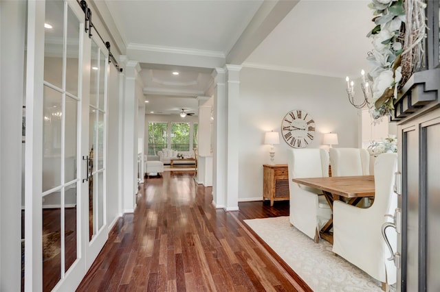 3350 Precinct Line Rd, Richmond, TX 77406 - foyer entrance with ornamental molding, dark wood-style flooring, french doors, baseboards, and a barn door