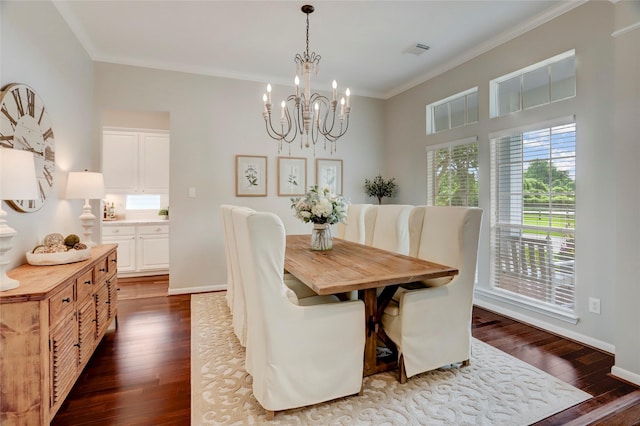 3350 Precinct Line Rd, Richmond, TX 77406 - dining space featuring dark wood-style floors, a chandelier, crown molding, and baseboards