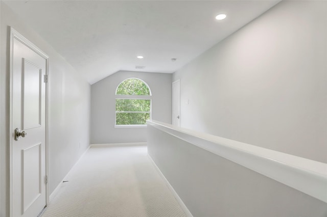3350 Precinct Line Rd, Richmond, TX 77406 - corridor featuring vaulted ceiling, light carpet, baseboards, and recessed lighting