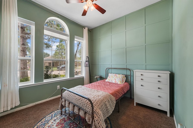 14327 Cranbrook Creek Ln, Houston, TX 77044 - bedroom featuring dark carpet, baseboards, and ceiling fan