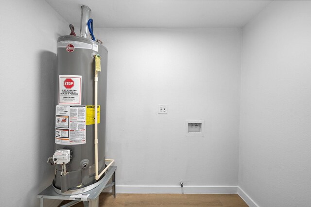 7109 Saint Augustine St, Houston, TX 77021 - utility room featuring gas water heater