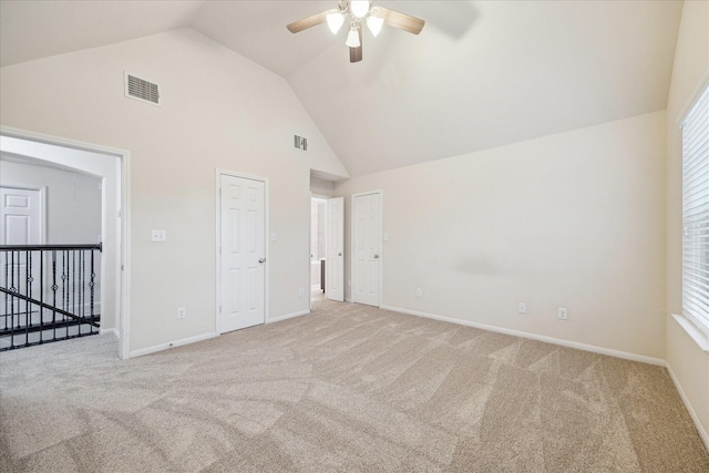 18621 Serenity Loch Dr, Spring, TX 77379 - unfurnished bedroom with high vaulted ceiling, light carpet, baseboards, and a ceiling fan