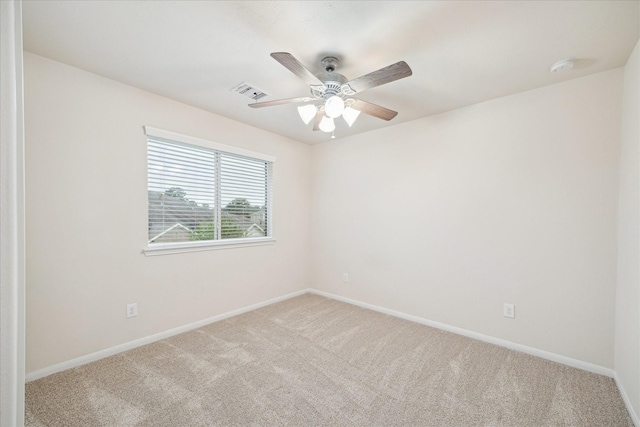 18621 Serenity Loch Dr, Spring, TX 77379 - spare room featuring carpet floors, ceiling fan, baseboards, and a smoke detector