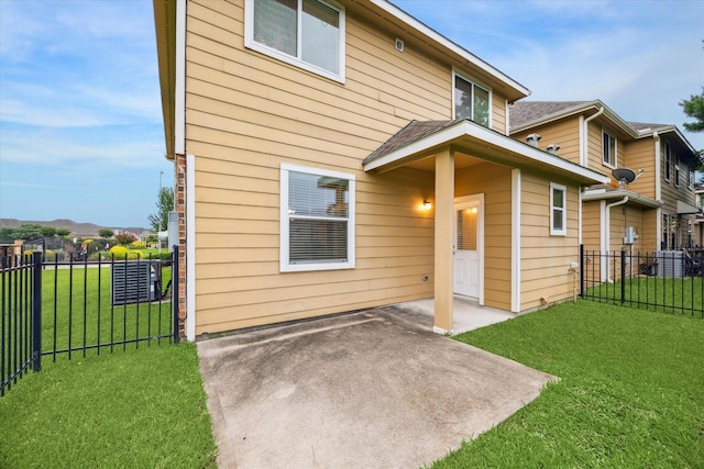 18621 Serenity Loch Dr, Spring, TX 77379 - rear view of property with a patio area