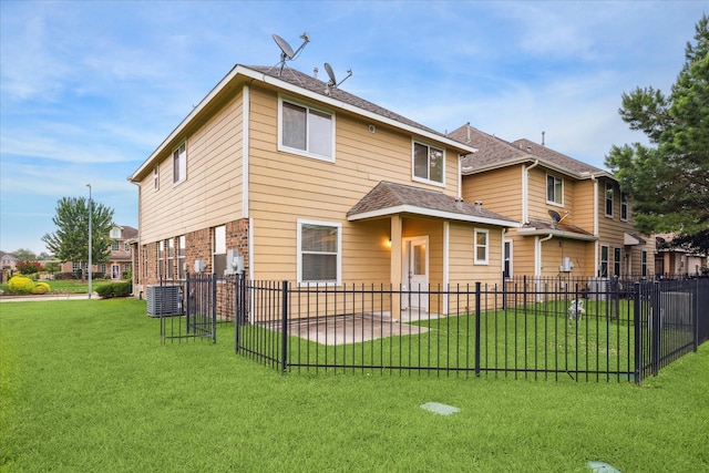 18621 Serenity Loch Dr, Spring, TX 77379 - rear view of property with central AC and roof with shingles