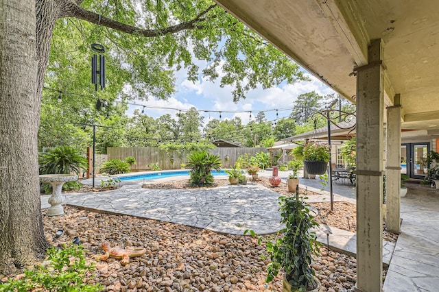 29742 Geneva Dr, Spring, TX 77386 - fenced backyard with a patio