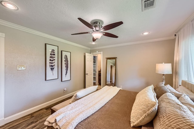 29742 Geneva Dr, Spring, TX 77386 - bedroom with wood finished floors, baseboards, crown molding, ceiling fan, and recessed lighting