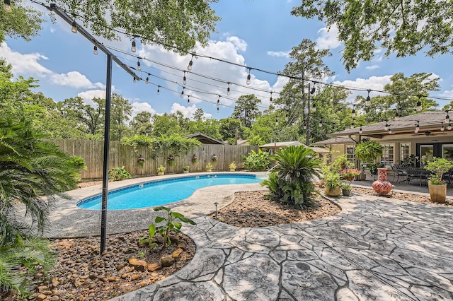 29742 Geneva Dr, Spring, TX 77386 - view of pool featuring a patio area and a fenced backyard