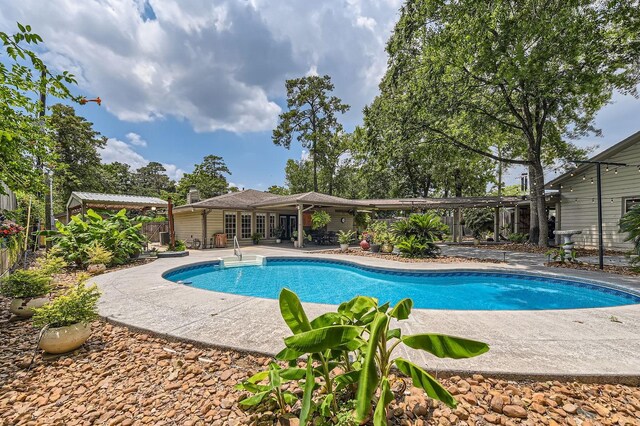 29742 Geneva Dr, Spring, TX 77386 - outdoor pool with a patio area
