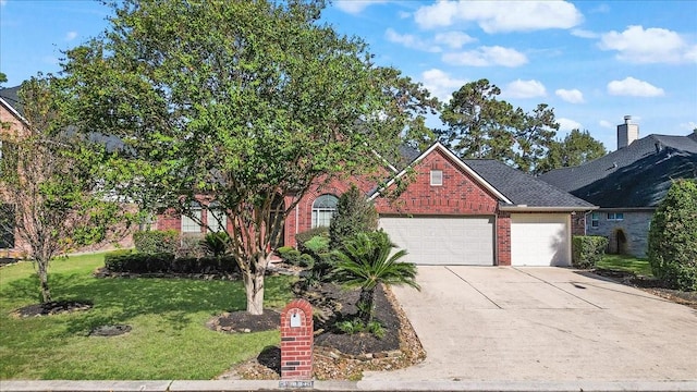 8511 Silver Lure Dr, Humble, TX 77346 - view of front of house featuring brick siding, an attached garage, driveway, and a front lawn