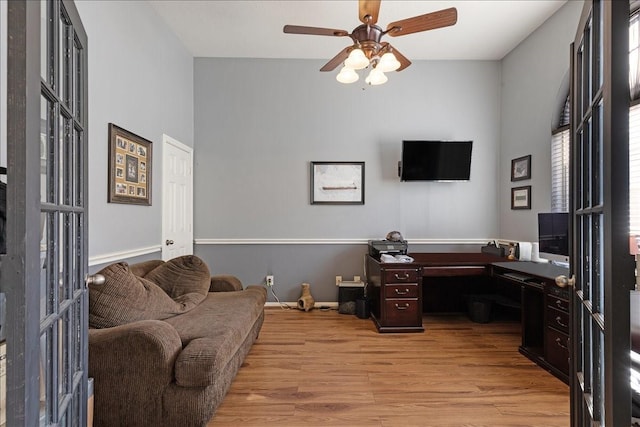 8511 Silver Lure Dr, Humble, TX 77346 - office with light wood finished floors and ceiling fan