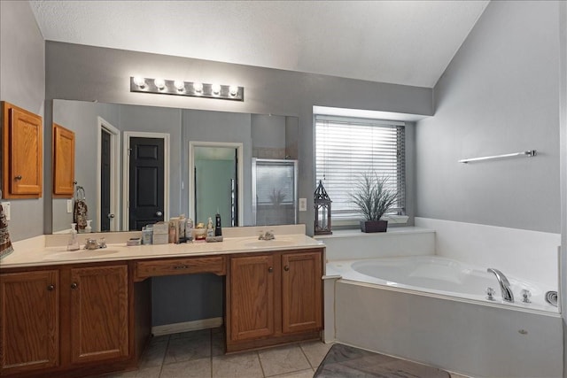 8511 Silver Lure Dr, Humble, TX 77346 - full bath featuring a shower stall, double vanity, a bath, tile patterned floors, and vaulted ceiling